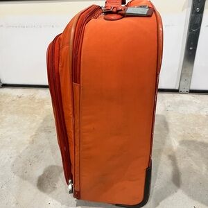 Tumi Vibrant Orange Travel Bag